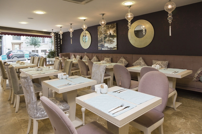 Imagen del bar/restaurante del Hotel Turkuaz Suites. Foto 5