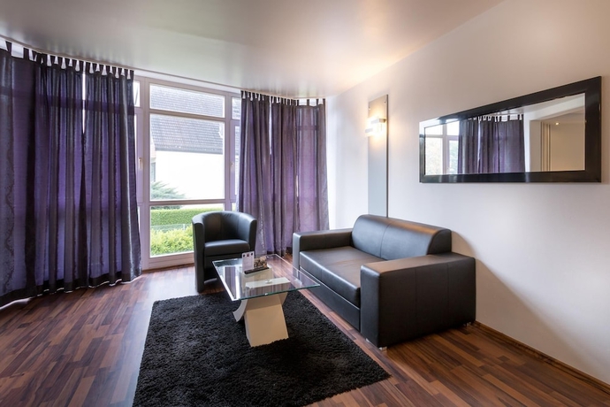 Imagen de la habitación del Hotel Turmhotel Rhein Main. Foto 3