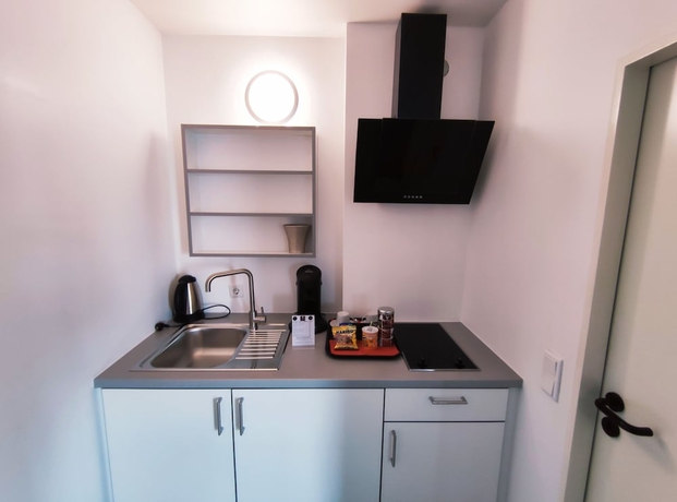 Imagen de la habitación del Hotel Turmhotel Rhein Main. Foto 6