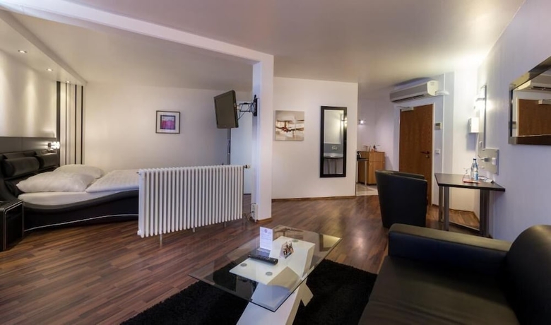 Imagen de la habitación del Hotel Turmhotel Rhein Main. Foto 7