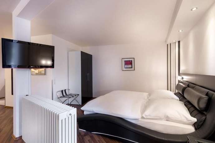 Imagen de la habitación del Hotel Turmhotel Rhein Main. Foto 8