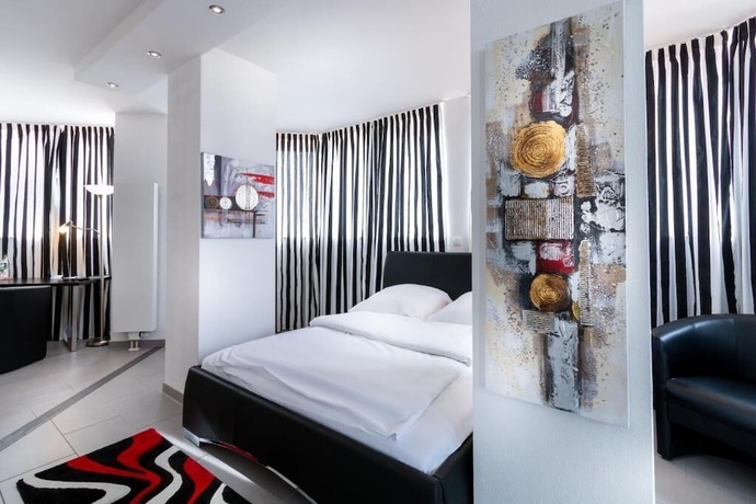 Imagen de la habitación del Hotel Turmhotel Rhein Main. Foto 9