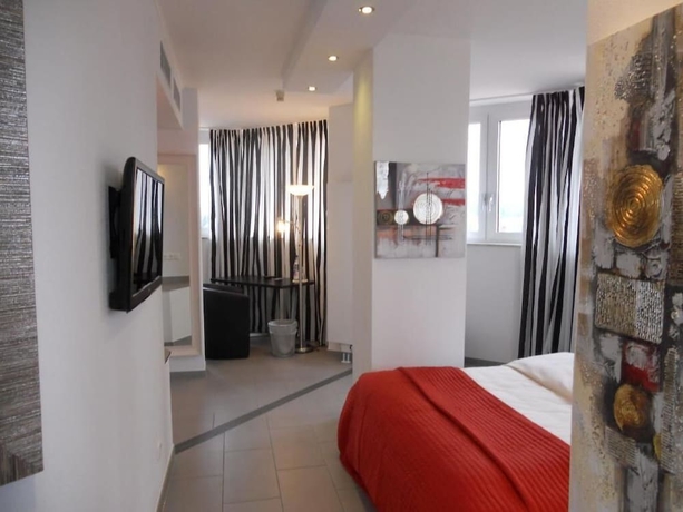 Imagen de la habitación del Hotel Turmhotel Rhein Main. Foto 11