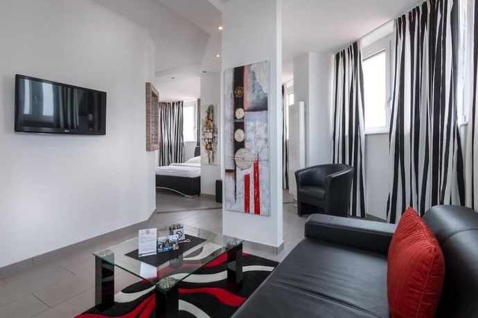 Imagen de la habitación del Hotel Turmhotel Rhein Main. Foto 16