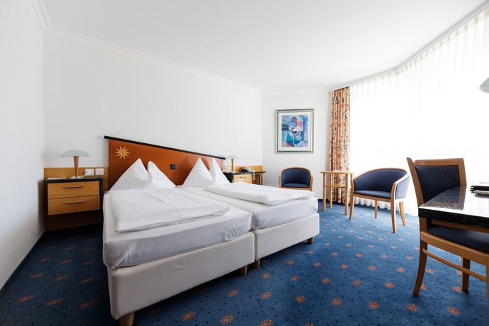 Imagen de la habitación del Hotel Turmhotel Victoria. Foto 9