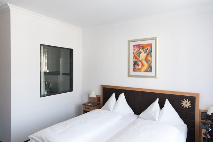 Imagen de la habitación del Hotel Turmhotel Victoria. Foto 14