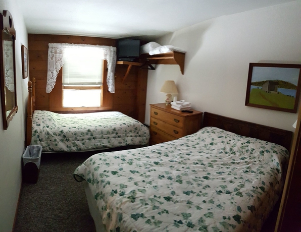 Imagen de la habitación del Hotel Turn Of River Lodge. Foto 8