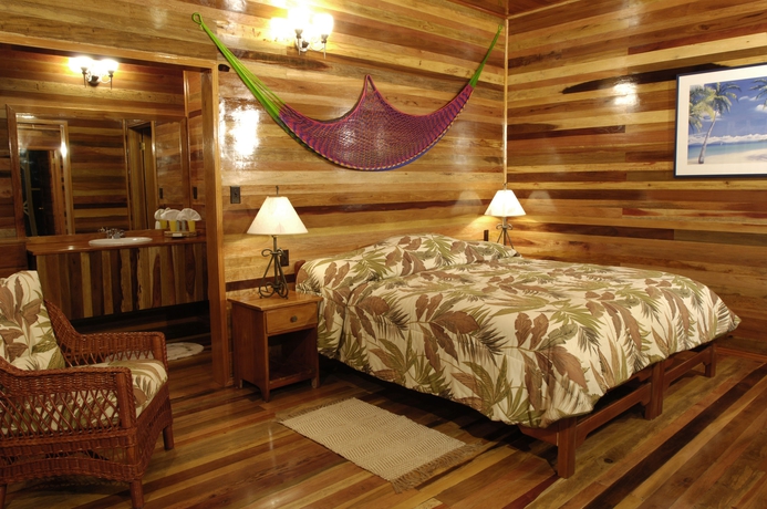 Imagen de la habitación del Hotel Turneffe Island Resort. Foto 7