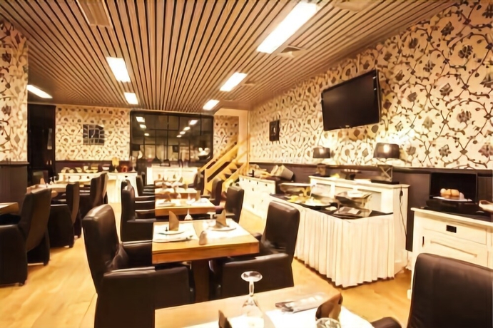 Imagen del bar/restaurante del Hotel Turnhout City. Foto 7