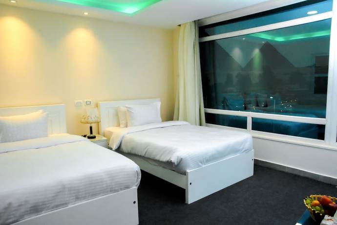 Imagen de la habitación del Hotel Turquoise Pyramids View. Foto 5