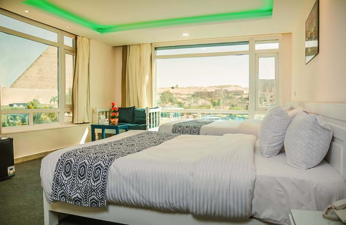 Imagen de la habitación del Hotel Turquoise Pyramids View. Foto 11