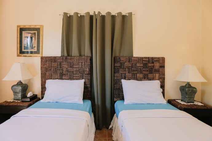 Imagen de la habitación del Hotel Turtle Bay Dive Resort. Foto 5