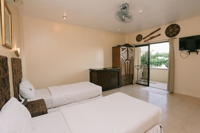 Imagen de la habitación del Hotel Turtle Bay Dive Resort. Foto 11