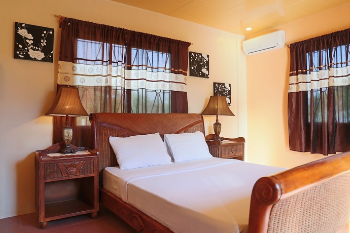 Imagen de la habitación del Hotel Turtle Bay Dive Resort. Foto 13