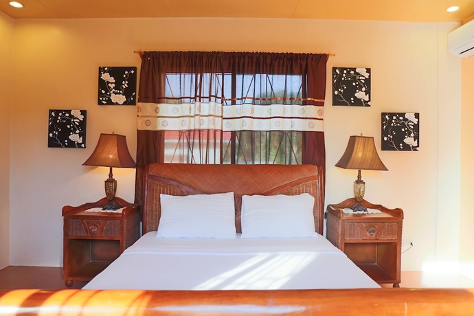 Imagen de la habitación del Hotel Turtle Bay Dive Resort. Foto 15