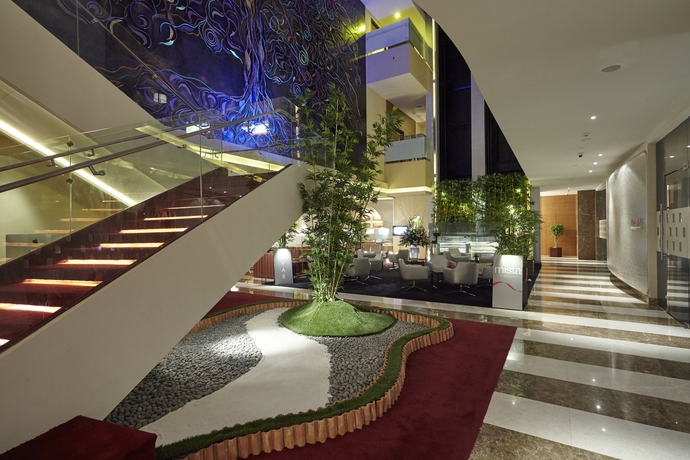 Imagen del bar/restaurante del Hotel Turyaa Chennai. Foto 2