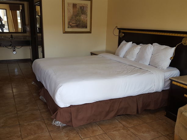 Imagen de la habitación del Hotel Tuscan Garden Inn. Foto 4