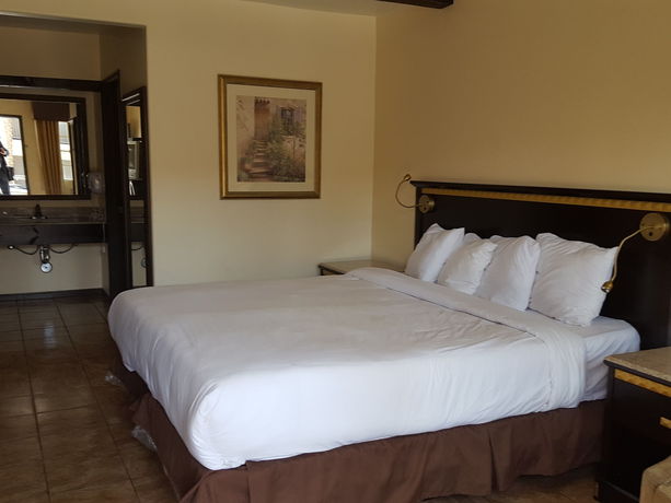 Imagen de la habitación del Hotel Tuscan Garden Inn. Foto 5