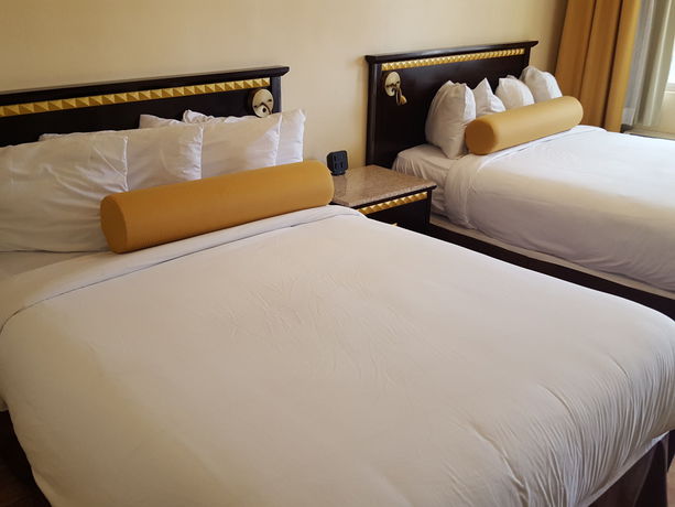 Imagen de la habitación del Hotel Tuscan Garden Inn. Foto 8