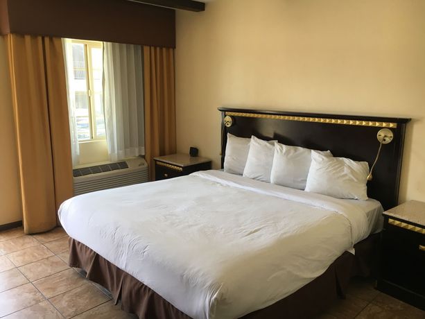 Imagen de la habitación del Hotel Tuscan Garden Inn. Foto 11