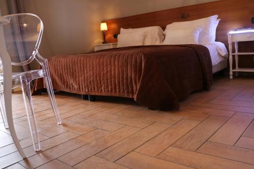 Imagen de la habitación del Hotel Tuscania Panoramico. Foto 7