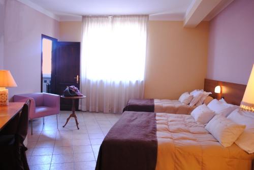 Imagen de la habitación del Hotel Tuscania Panoramico. Foto 8