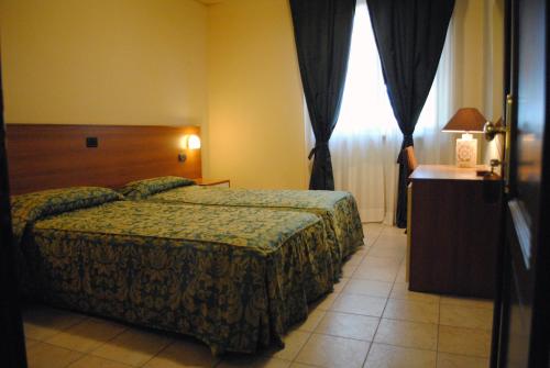 Imagen de la habitación del Hotel Tuscania Panoramico. Foto 9