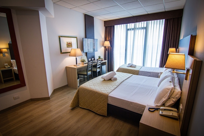 Imagen de la habitación del Hotel Tuscany Inn. Foto 14