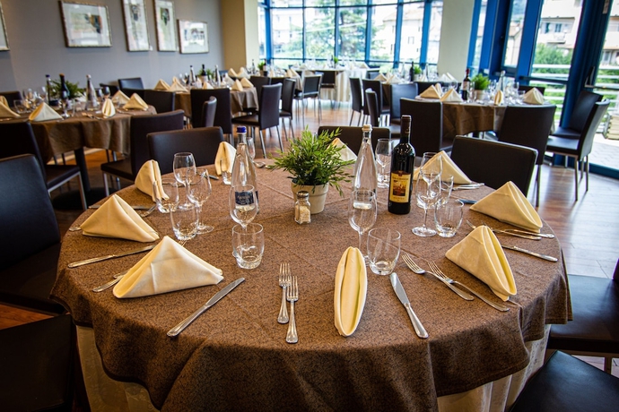 Imagen del bar/restaurante del Hotel Tuscany Inn. Foto 5