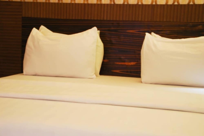 Imagen de la habitación del Hotel Tuscany Suites. Foto 10