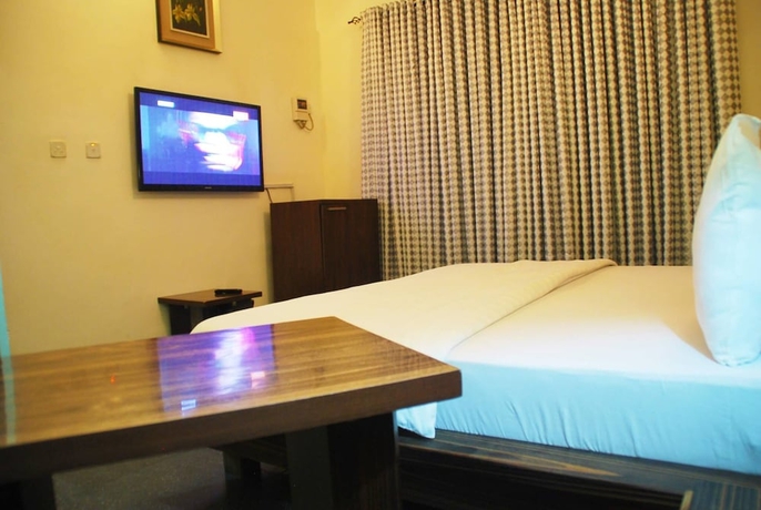 Imagen de la habitación del Hotel Tuscany Suites. Foto 13