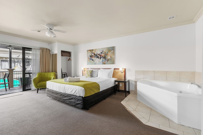 Imagen de la habitación del Hotel Tuscany Villas Boutique Motel. Foto 13