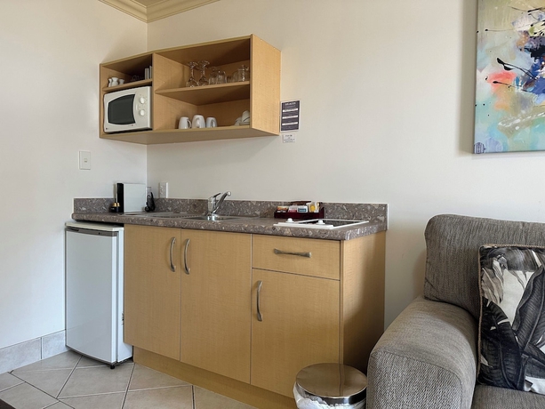 Imagen de la habitación del Hotel Tuscany Villas Boutique Motel. Foto 15