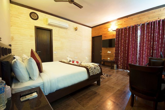 Imagen de la habitación del Hotel Tuskar\'s Riverside Resort. Foto 9