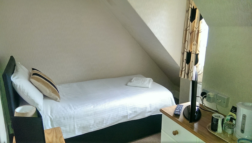 Imagen de la habitación del Hotel Tusker Lodge. Foto 6