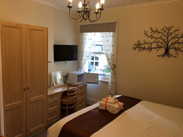 Imagen de la habitación del Hotel Tusker Lodge. Foto 10
