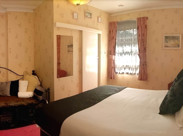 Imagen de la habitación del Hotel Tusker Lodge. Foto 11