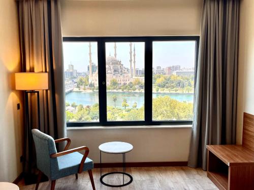 Imagen de la habitación del Hotel T&uuml;rkmen Riverside Adana. Foto 14