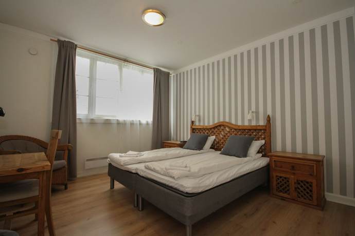 Imagen de la habitación del Hotel Tvedestrand Fjordhotell - Unikeler. Foto 19