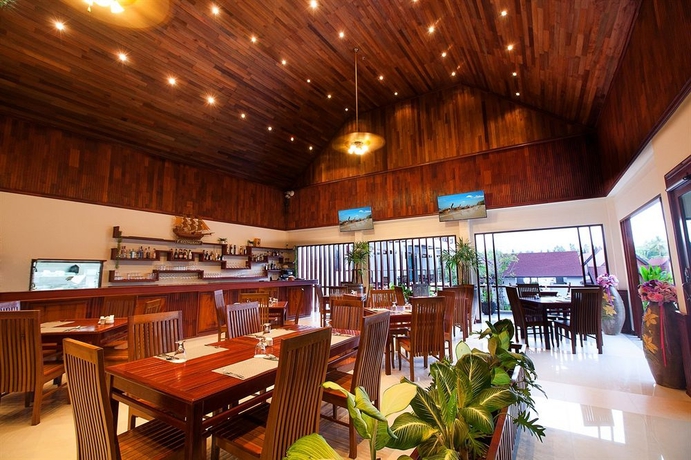 Imagen del bar/restaurante del Hotel T-villa Phuket Nai Yang Beach. Foto 3