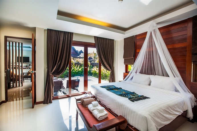 Imagen de la habitación del Hotel T-villa Phuket Nai Yang Beach. Foto 11