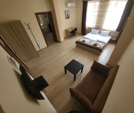Imagen de la habitación del Hotel Twain Apart and Rooms. Foto 17