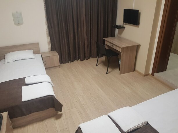 Imagen de la habitación del Hotel Twain Apart and Rooms. Foto 18