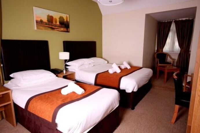 Imagen de la habitación del Hotel Twelve Knights. Foto 13