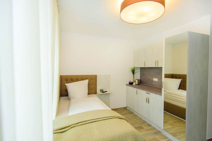 Imagen de la habitación del Hotel TwentyFour Living. Foto 5