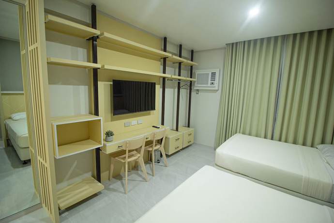 Imagen de la habitación del Hotel Twin Hearts Residences 1. Foto 1