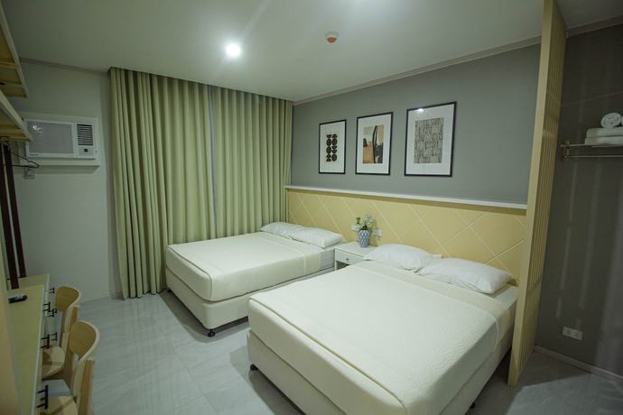 Imagen de la habitación del Hotel Twin Hearts Residences 1. Foto 3
