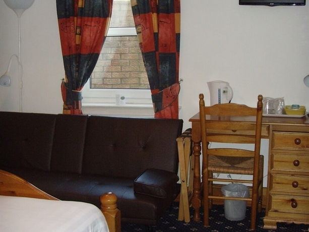 Imagen de la habitación del Hotel Twin Lions. Foto 17