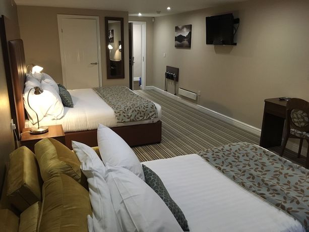 Imagen de la habitación del Hotel Twin Oaks. Foto 6