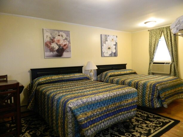 Imagen de la habitación del Hotel Twin Oaks Motel. Foto 19